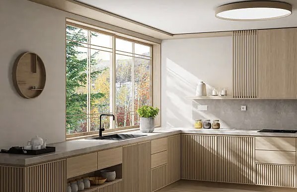Bright kitchen with a large new window over the sink